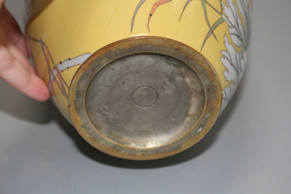 A Japanese Meiji period cloisonne vase, decorated with a crab and fading foliage against a beige ground, height 24cm